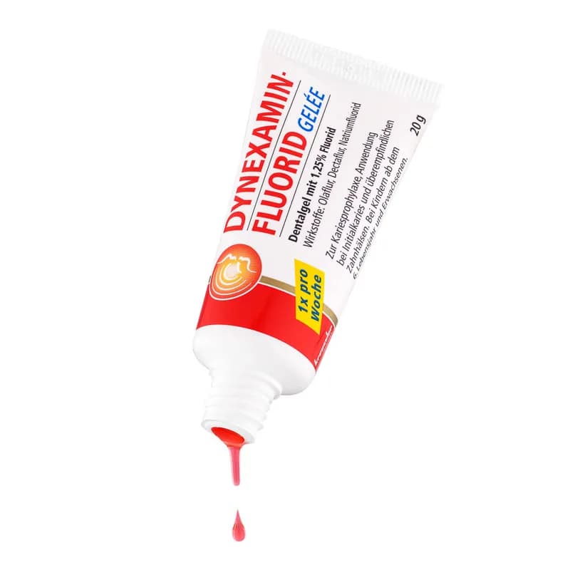 Tube Fluorid-Gelee mit austretendem rotem Gel, Packshot vor Weiß